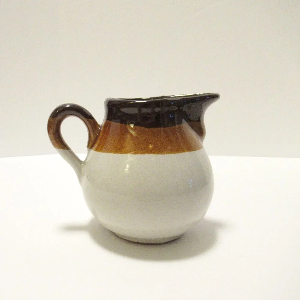 Brown and White Ceramic Serveware Pitcher